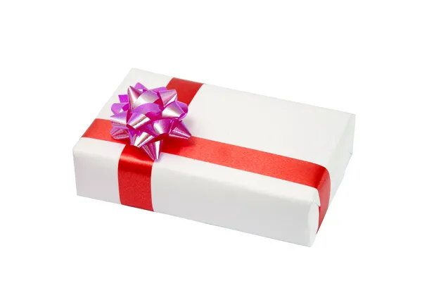 Single red gift box with silver ribbon on white background. — Stock Photo, Image