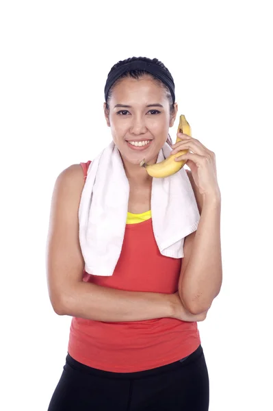 体育女人与孤立的白色背景上的香蕉 — 图库照片