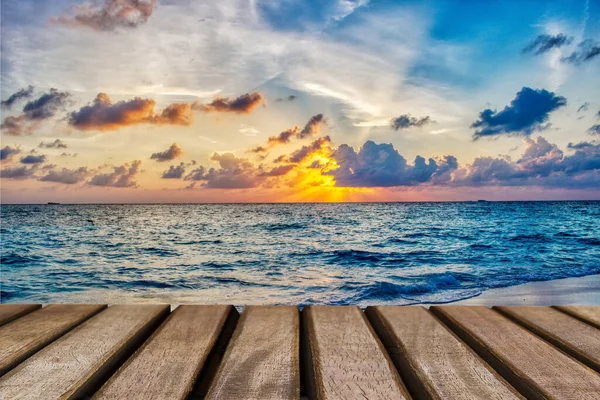 Empty wooden table and view of the ocean background