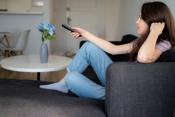 Woman Sitting Sofa Watching Home Girl Using Remote Control — Stock Photo, Image