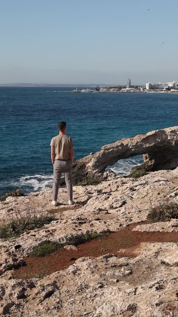 Young Man Standing Edge Sea Caves Love Bridge Ayia Napa — Video