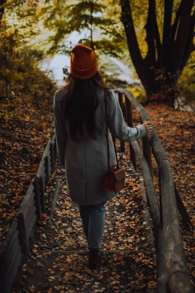 Young Girl Walking Alone Wooden Park Autumn Season Woman Orange — Stock Photo, Image