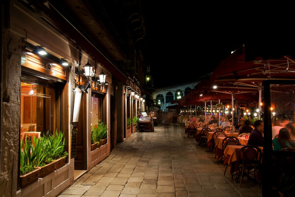 Venice street to Rialto Bridge at night, Italy