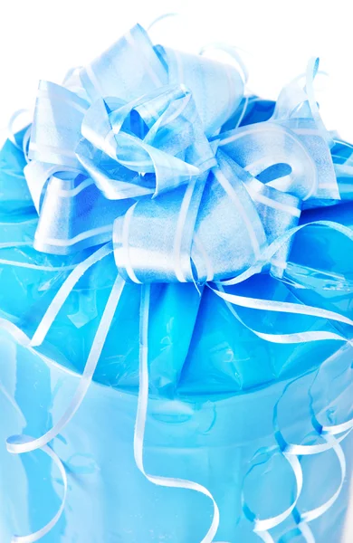 Festive packed blue nacreous present with big bow isolated on wh — Stock Photo, Image