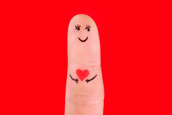 Concept de couple heureux un homme et une femme câlin, peint aux doigts — Photo