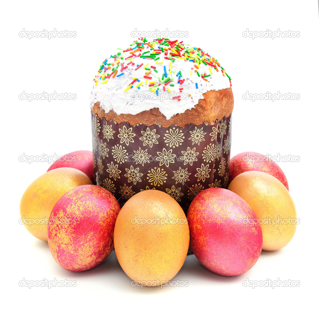 Easter cake with sugar glaze and painted eggs isolated on white