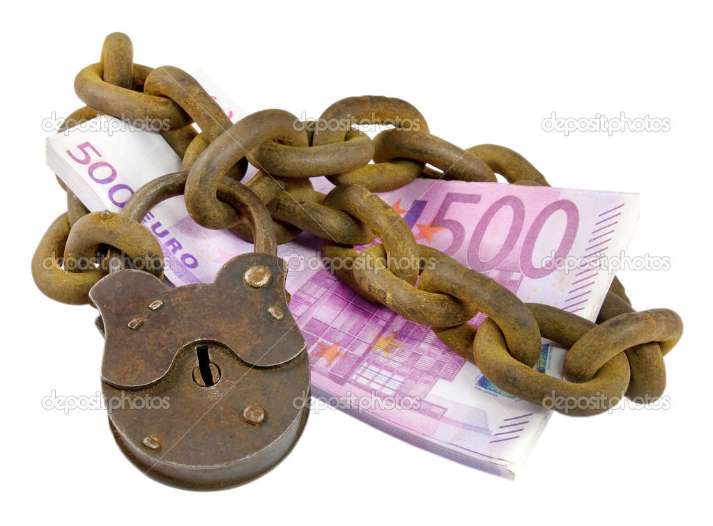 Money security concept - euro pile under lock and key