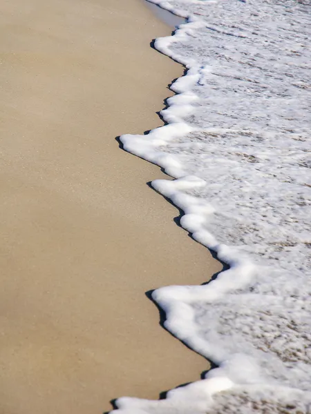 Sand beach and wave background — Stock Photo, Image