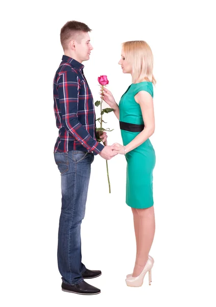 Άνθρωπος με τριαντάφυλλο κάνοντας έκπληξη για την γυναίκα — Φωτογραφία Αρχείου