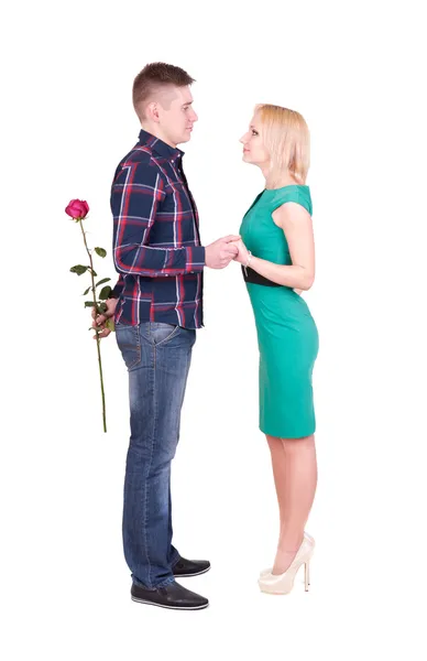 Man with rose making surprise for his woman — Stock Photo, Image