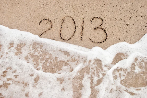 Année 2013 lavage - concept de plage pour bonne année 2014 — Photo