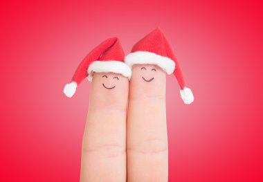 Noel Baba şapkaları parmak yüzleri