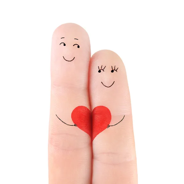 Family concept - man and woman hold on the red heart — Stock Photo, Image