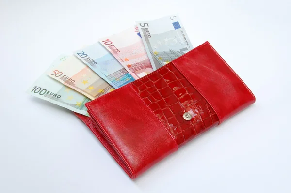 Käsilaukussa olevat setelit — kuvapankkivalokuva