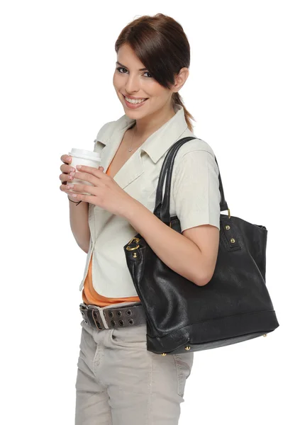 Businesswoman holding a coffee cup in her hand — Stock Photo, Image