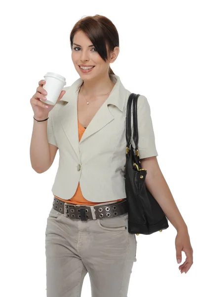 Kobieta trzyma filiżanki kawy w dłoni — Zdjęcie stockowe