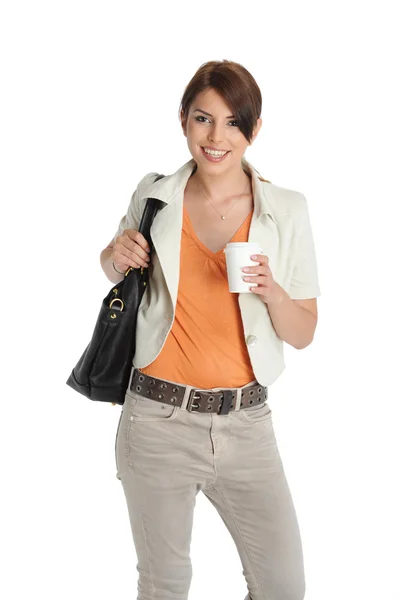 Businesswoman holding a coffee cup in her hand — Stock Photo, Image