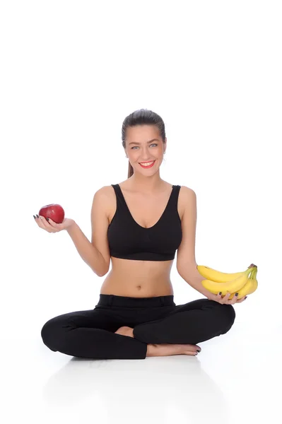 Portrait of young woman meditating in pose of lotus in isolatio — Stock Photo, Image