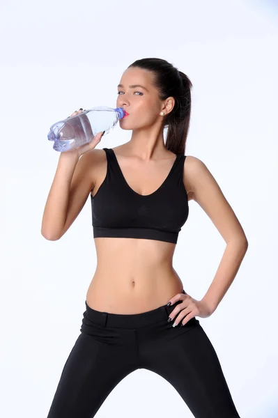 Fiatal nő hidratáló után exercis — Stock Fotó