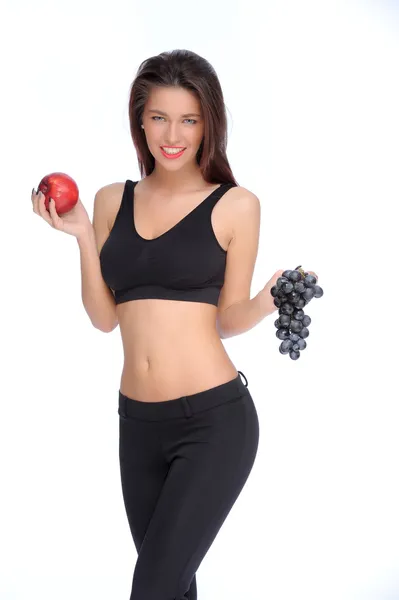 Söt ung dam som håller rött äpple medan isolerade på whit — Stockfoto