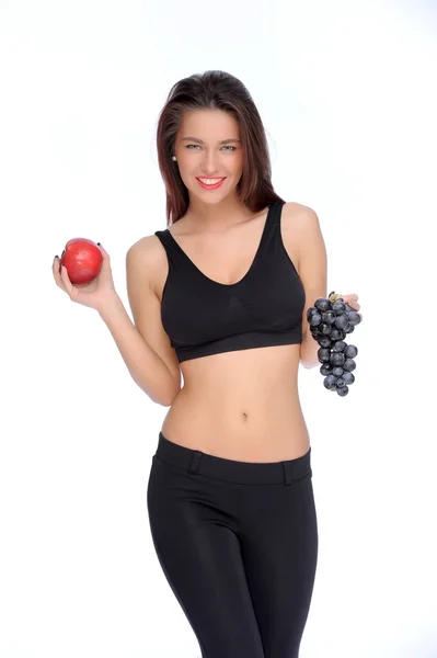 Cute young lady holding red apple while isolated on whit — Stock Photo, Image