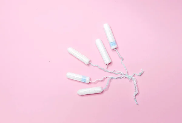 Many Sanitary Tampons Lie Row Light Pink Background Menstrual Cycle — Stock Photo, Image