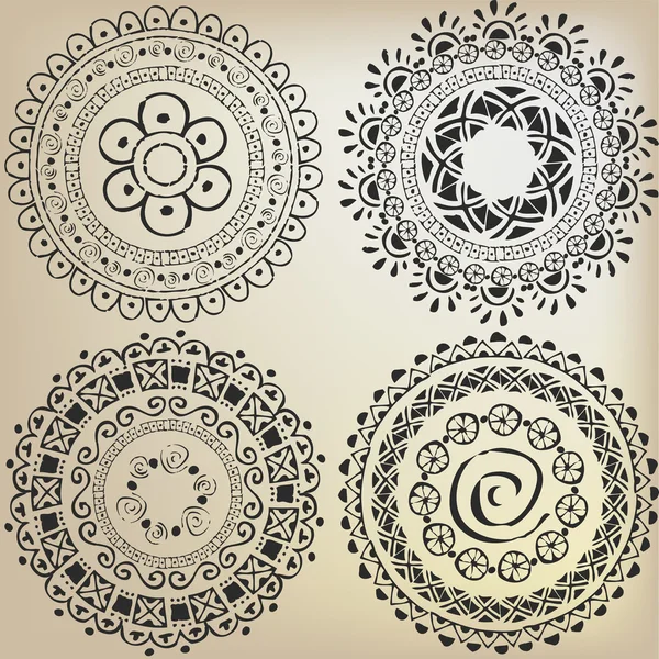 Ensemble de motifs ethniques sous la forme mandala — Image vectorielle