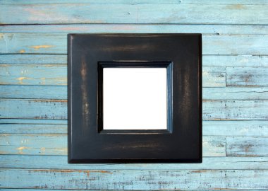 Mavi ahşap zemin üzerine siyah vintage fotoğraf çerçevesi