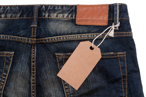 Blue jeans detail blank tag paper jeans label — Stock Photo, Image