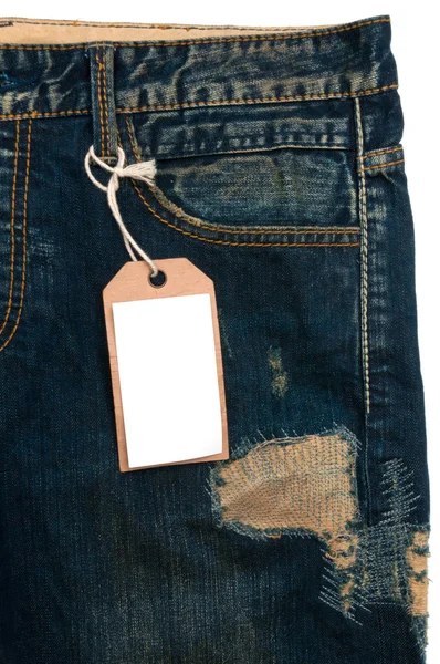 Blue jeans detail blank tag paper jeans label — Stock Photo, Image