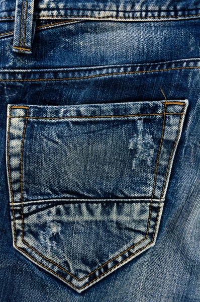 Dettaglio del denim nero strappato, vista frontale jean — Foto Stock
