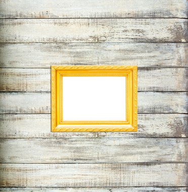 eski ahşap zemin üzerine altın antika resim çerçevesi