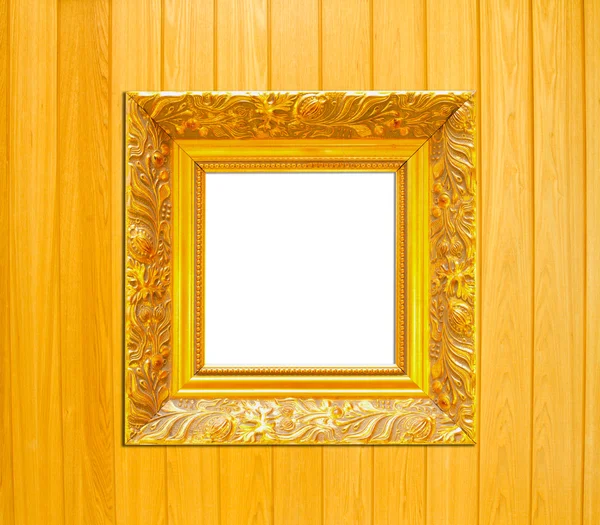 Gold Vintage picture frame on wood background — Stock Photo, Image