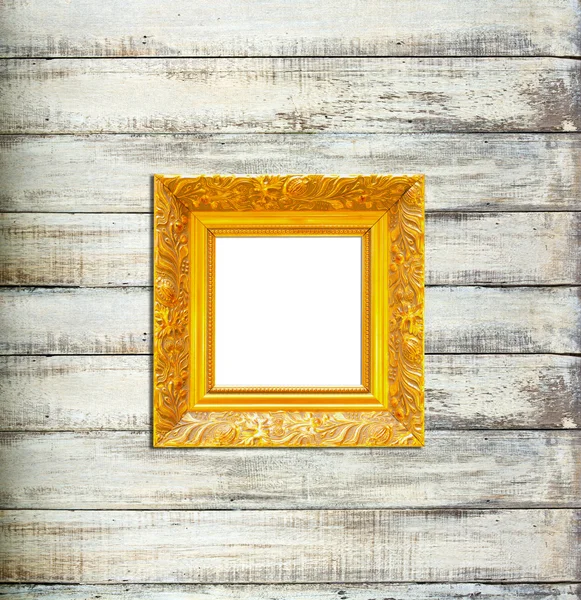Gold Vintage picture frame on old wood background — Stock Photo, Image