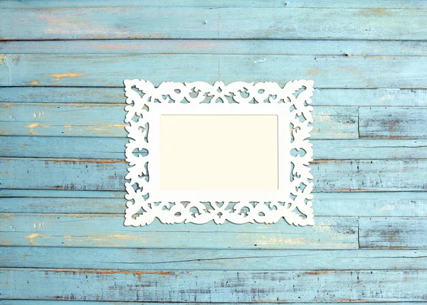 Bianco Vintage cornice su sfondo di legno blu — Foto Stock