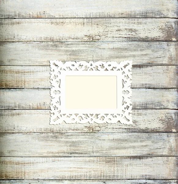 White Vintage picture frame on old wood background — Stock Photo, Image