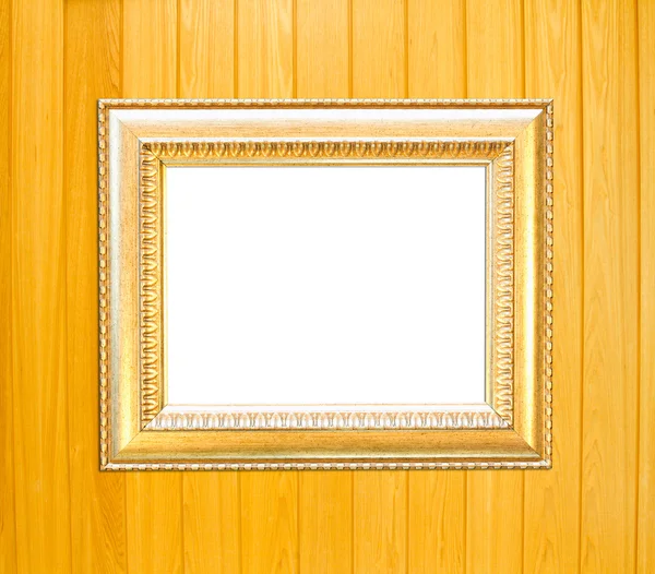 Gold Vintage picture frame on wood background — Stock Photo, Image