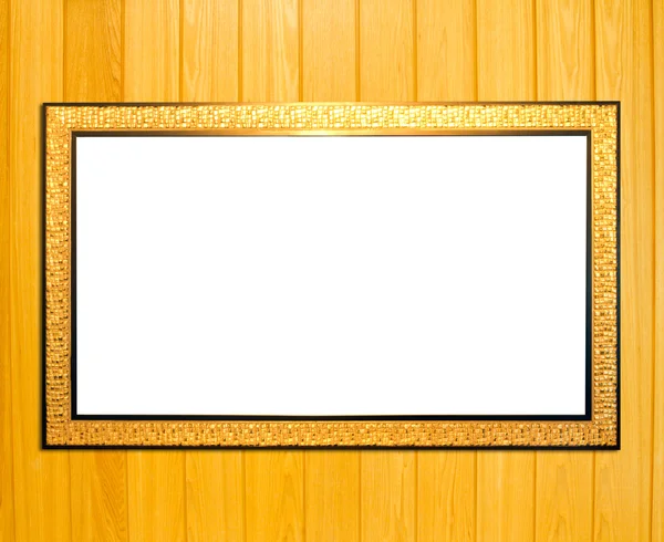 Золотая винтажная рамка на фоне дерева — стоковое фото