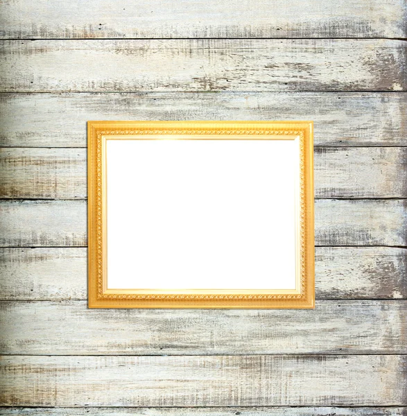 Gold Vintage picture frame on old wood background — Stock Photo, Image