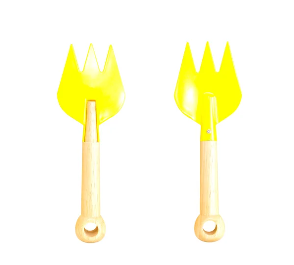 Yellow toy spade — Stock Photo, Image