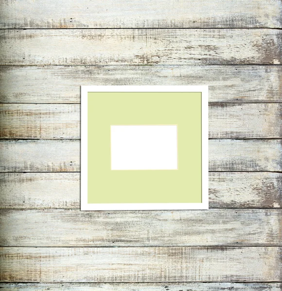 White Vintage picture frame on old wood background — Stock Photo, Image