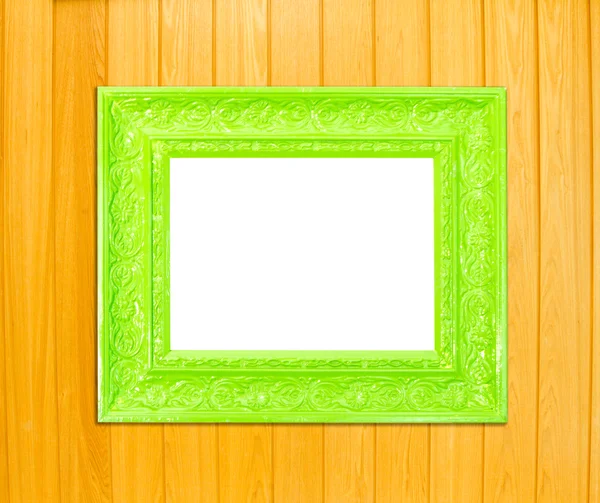 Green Vintage picture frame on wood background — Stock Photo, Image