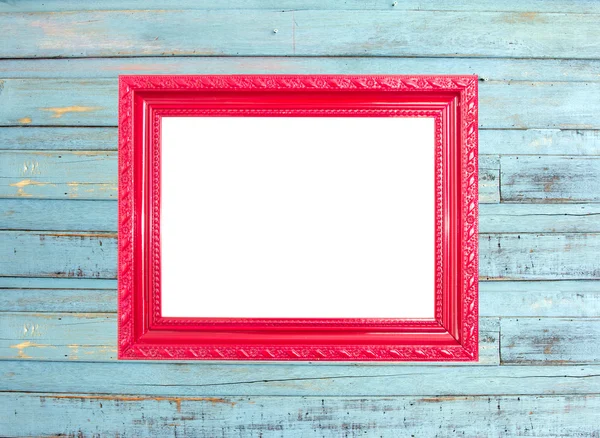 Mavi ahşap zemin üzerinde kırmızı vintage fotoğraf çerçevesi