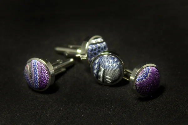 Cufflinks on a black background — Stock Photo, Image