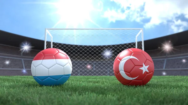 Due Palloni Calcio Bandiere Colori Sfondo Sfocato Stadio Lussemburgo Turchia — Foto Stock