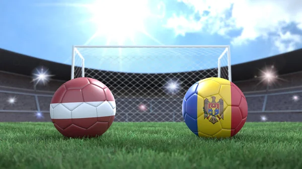 Duas Bolas Futebol Bandeiras Cores Estádio Desfocado Fundo Letónia Moldávia — Fotografia de Stock