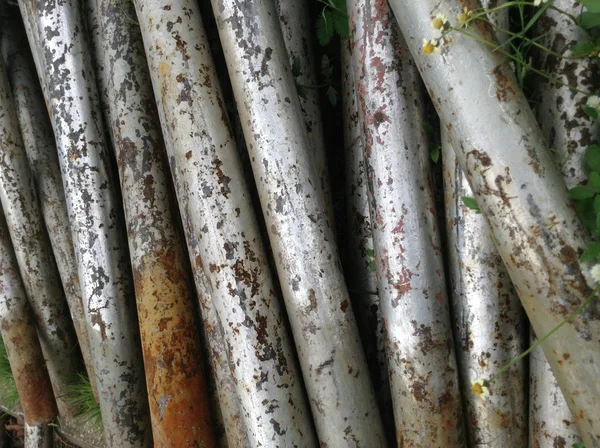 Tubos de ferro empilhados — Fotografia de Stock
