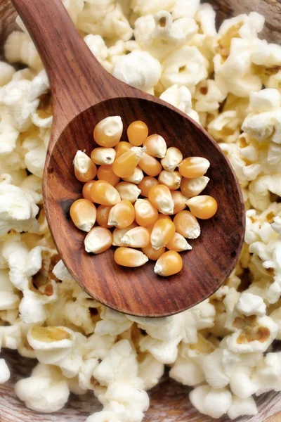 Popcorn and corn grain — Stock Photo, Image