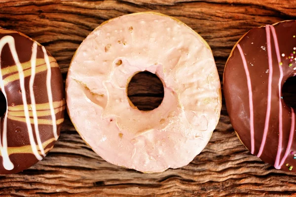 Chocolate and strawberry donuts — Stock Photo, Image