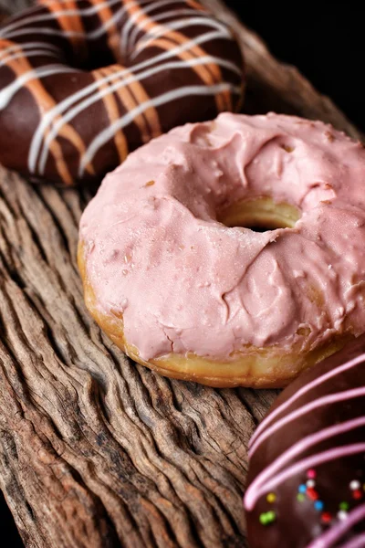 Chocolate and strawberry donuts — Stock Photo, Image